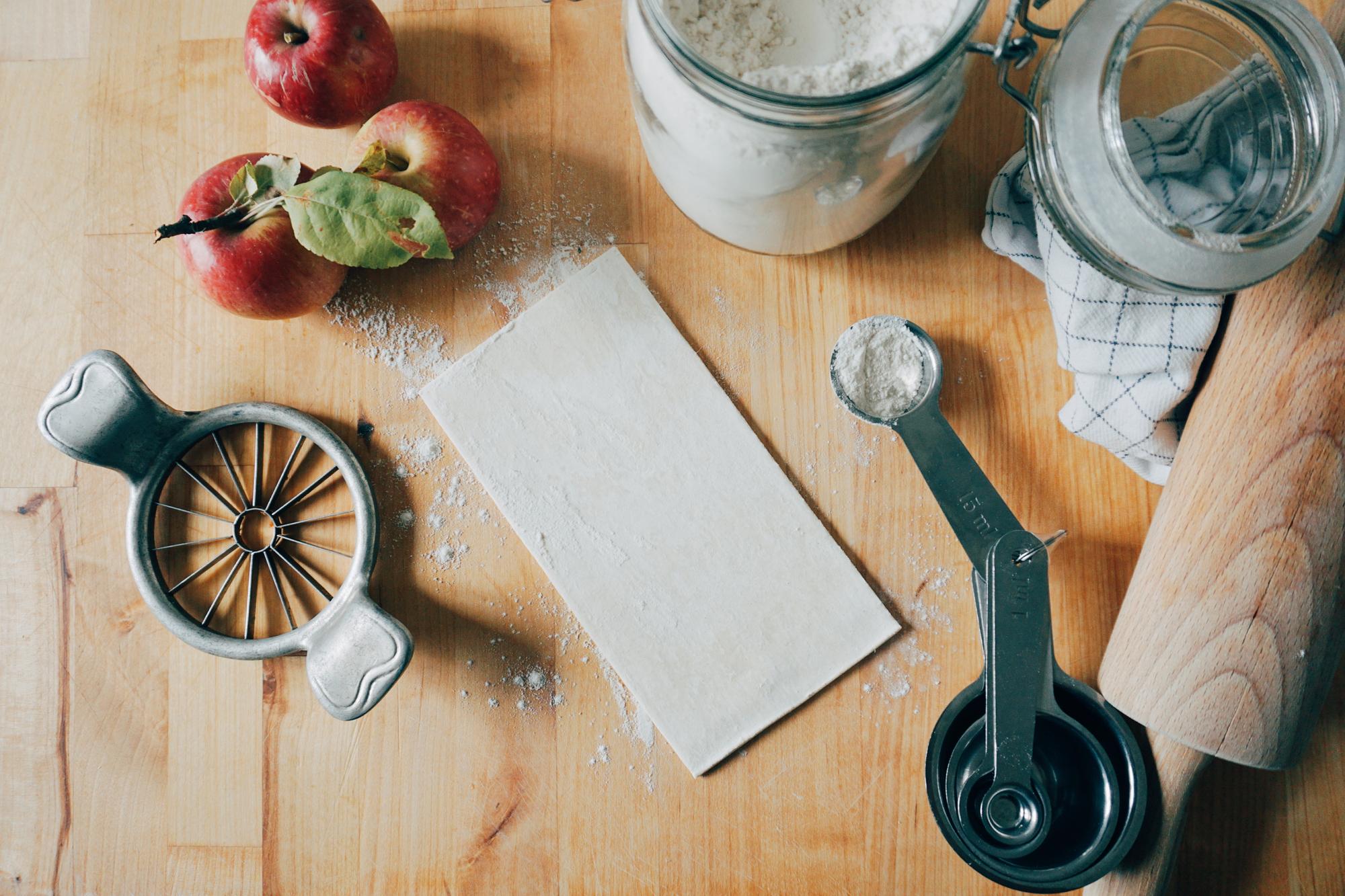 Set of recipe cards and kitchen tools on a clean table